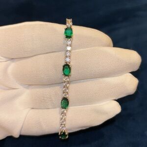 Emerald green and white sapphire Sparkly Silver Plated Tennis Bra…